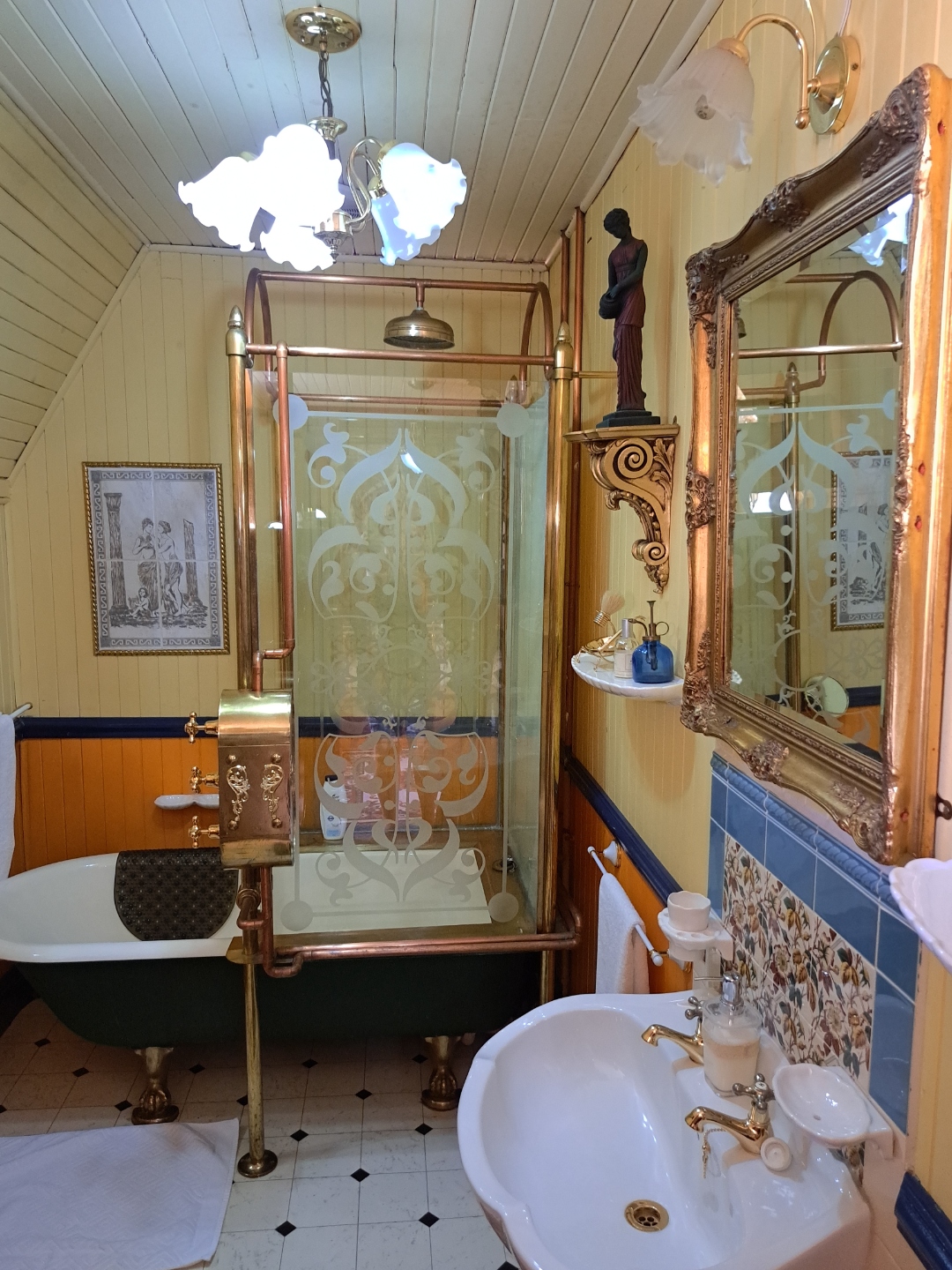 Gold Room — ornate copper shower and basin
